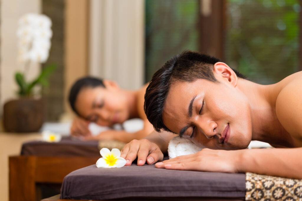 couple feeling relaxed during home couples massage